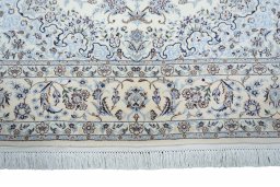 Full view of New Nain rug from Iran / Persia, 226 × 153 cm in Beige tones
