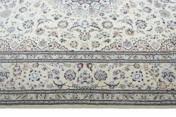 Corner detail of New Nain rug showing border pattern and Cork pile