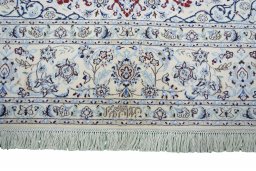 Corner detail of New Nain rug showing border pattern and Cork pile