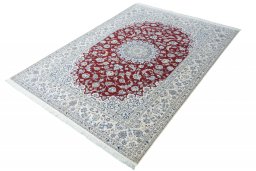 Corner detail of New Nain rug showing border pattern and Cork pile