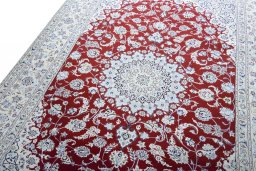 Backside of handmade New Nain rug showing knot structure and weave density