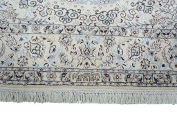 Corner detail of New Nain rug showing border pattern and Cork pile