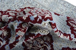 Corner detail of New Nain rug showing border pattern and Cork pile