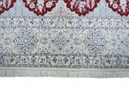 Central medallion detail of New Nain rug from Iran / Persia