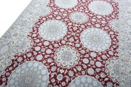 Backside of handmade New Nain rug showing knot structure and weave density