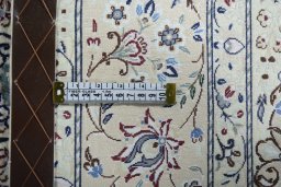 Central medallion detail of New Nain rug from Iran / Persia