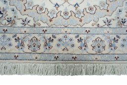 Corner detail of New Nain rug showing border pattern and Cork pile