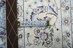 Central medallion detail of New Nain rug from Iran / Persia