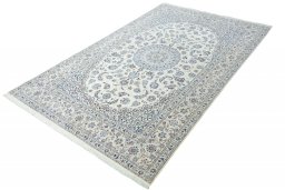Corner detail of New Nain rug showing border pattern and Cork pile