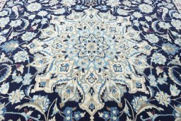 Central medallion detail of 2000s Nain rug from Iran / Persia