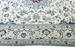 Close-up detail of 2000s Nain rug from Iran / Persia showing Wool weave