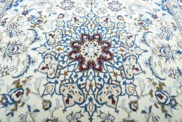 Central medallion detail of 2000s Nain rug from Iran / Persia