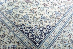 Close-up detail of 2000s Nain rug from Iran / Persia showing Wool weave