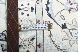Central medallion detail of New Nain rug from Iran / Persia