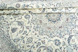 Surface texture of 2000s Nain rug with natural Cork and intricate pattern
