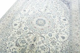 Backside of handmade 2000s Nain rug showing knot structure and weave density