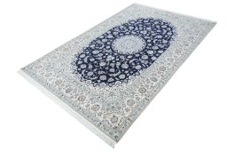 Corner detail of New Nain rug showing border pattern and Cork pile