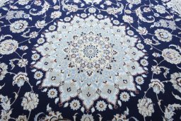 Central medallion detail of New Nain rug from Iran / Persia