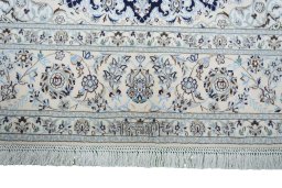 Full view of New Nain rug from Iran / Persia, 325 × 207 cm in Blue tones