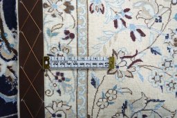 Central medallion detail of New Nain rug from Iran / Persia