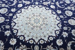 Central medallion detail of New Nain rug from Iran / Persia