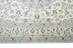 Corner detail of 2000s Nain rug showing border pattern and Cork pile