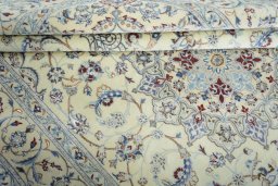 Close-up detail of 2000s Nain rug from Iran / Persia showing Cork weave