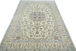 Surface texture of 2000s Nain rug with natural Cork and intricate pattern