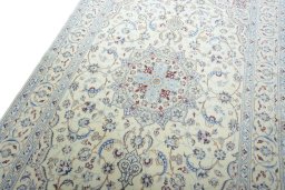 Backside of handmade 2000s Nain rug showing knot structure and weave density