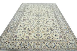 Surface texture of New Nain rug with natural Wool and intricate pattern