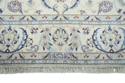 Full view of New Nain rug from Iran / Persia, 305 × 209 cm in Beige tones