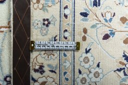 Central medallion detail of New Nain rug from Iran / Persia