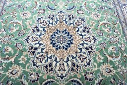 Central medallion detail of New Nain rug from Iran / Persia