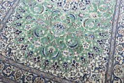 Close-up detail of New Nain rug from Iran / Persia showing Cork weave
