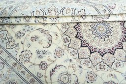 Close-up detail of New Nain rug from Iran / Persia showing Wool weave