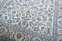Close-up detail of New Nain rug from Iran / Persia showing Wool weave