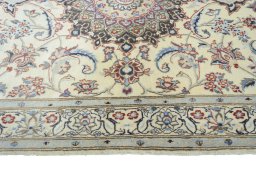 Corner detail of New Nain rug showing border pattern and Wool pile