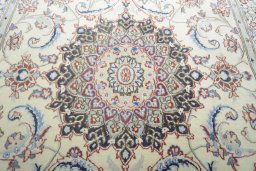 Central medallion detail of New Nain rug from Iran / Persia