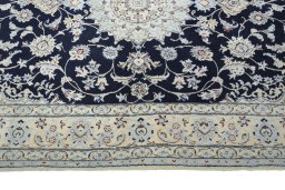 Corner detail of New Nain rug showing border pattern and Cork pile