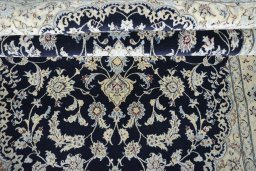 Close-up detail of New Nain rug from Iran / Persia showing Cork weave