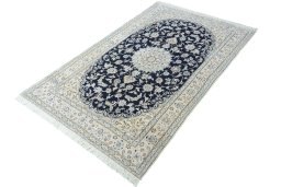 Corner detail of New Nain rug showing border pattern and Cork pile