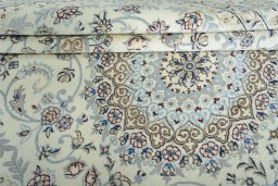 Close-up detail of 2000s Nain rug from Iran / Persia showing Wool weave