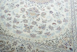 Close-up detail of 2000s Nain rug from Iran / Persia showing Wool weave