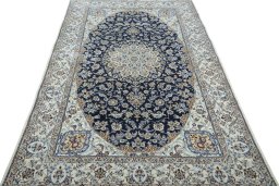 Surface texture of 2000s Nain rug with natural Cork and intricate pattern