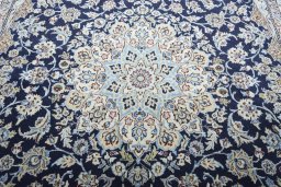Central medallion detail of 2000s Nain rug from Iran / Persia