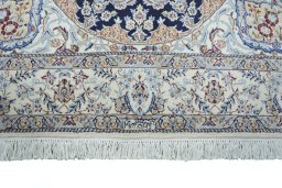 Full view of 2000s Nain rug from Iran / Persia, 229 × 148 cm in Beige tones