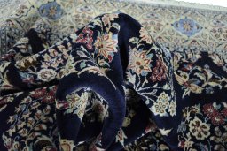 Corner detail of New Nain rug showing border pattern and Cork pile