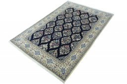 Corner detail of New Nain rug showing border pattern and Cork pile