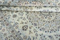 Close-up detail of New Nain rug from Iran / Persia showing Wool weave