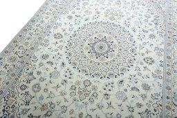 Backside of handmade New Nain rug showing knot structure and weave density